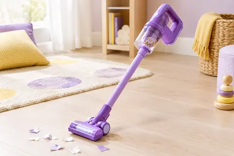 Aspirateur jouet violet avec long manche, buse courte et cylindre transparent à billes colorées